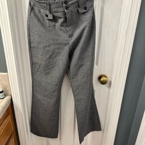 Boot-cut trousers mid rise. Business casual, Y2K cut, pocket accents